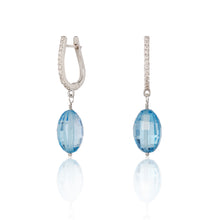 Load image into Gallery viewer, Diamond studded dangly earrings with blue Topaz drops
